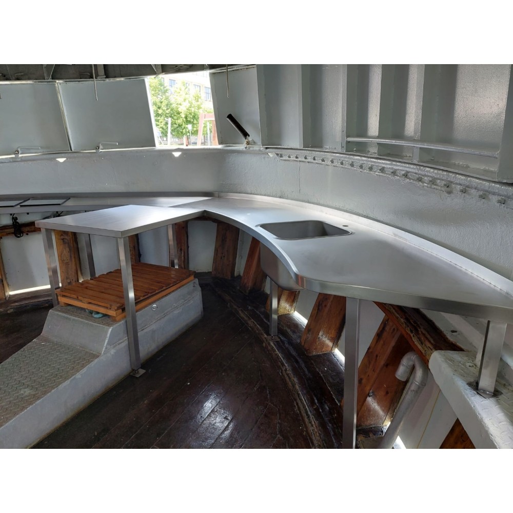 Circular table with sink on a yacht